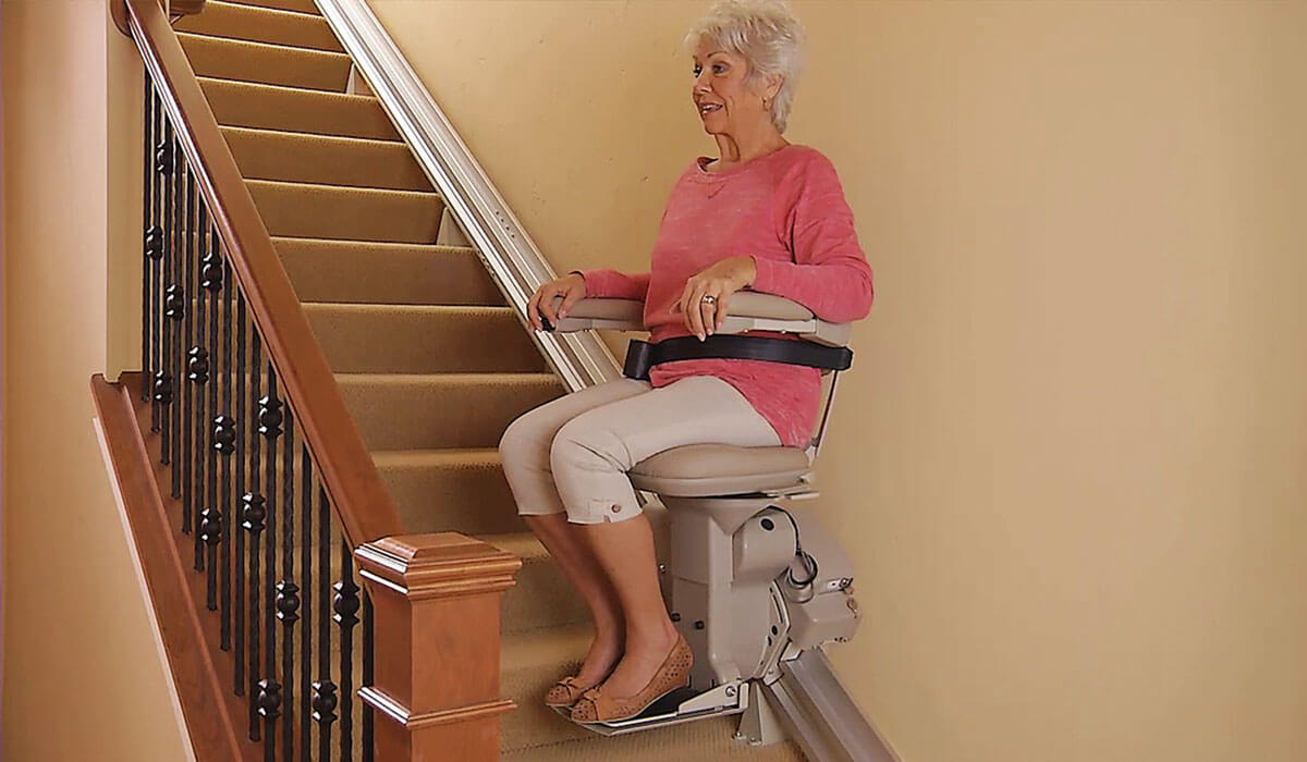 Woman on Bruno Elite stairlift