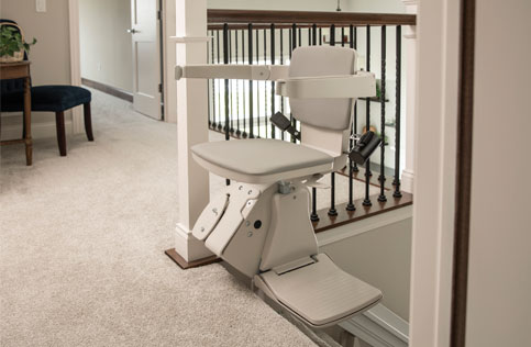 Empty Stairlift at top of steps