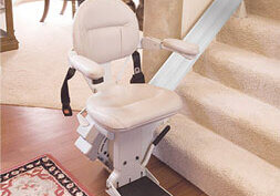 Bruno Elite stair lift at bottom of stairs