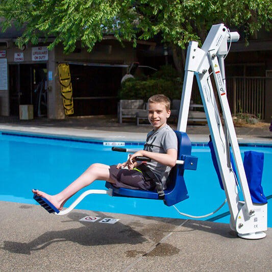 Person in pool life seat mounted near pool