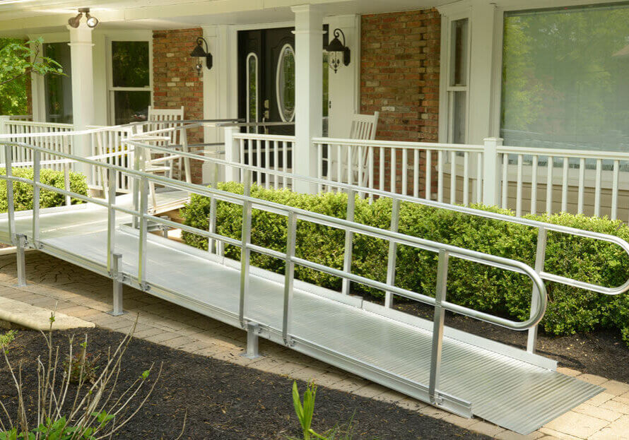 Wheelchair ramp outside front door of home